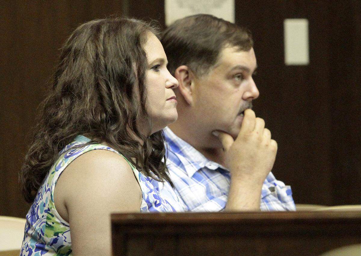 Rebecca Haynie, left, listens during her pretrial motion hearing Aug. 1, 2018, in Superior Court. Haynie and co-defendant Donald Keith “Bull” Phillips, right, face malice murder charges in the March 4, 2004 fatal shooting of Haynie’s estranged husband Kirby Smith.