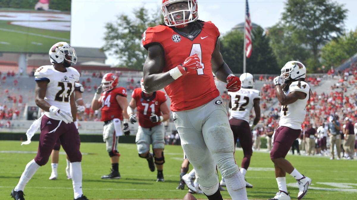 BEAU CABELL/THE TELEGRAPH.Athens, Georgia, 09/05/2015: Georgia running back Keith Marshall breezes through gaping hole for a 2-yd. touchdown in the fourth quarter giving the Bulldogs a 51-14 win over ULM.