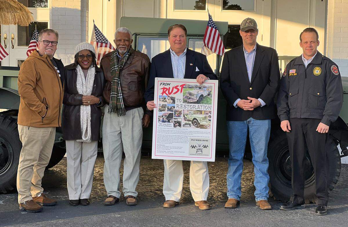 From left, Kevin Loncher, Vivian Murphy, Rev. Charles Bauknight, Greg Jordan, Staff Sgt. Dan Michael, and Columbus Fire Department Fire Marshal John Shull pose for a photograph after a presentation. 01/26/2023
