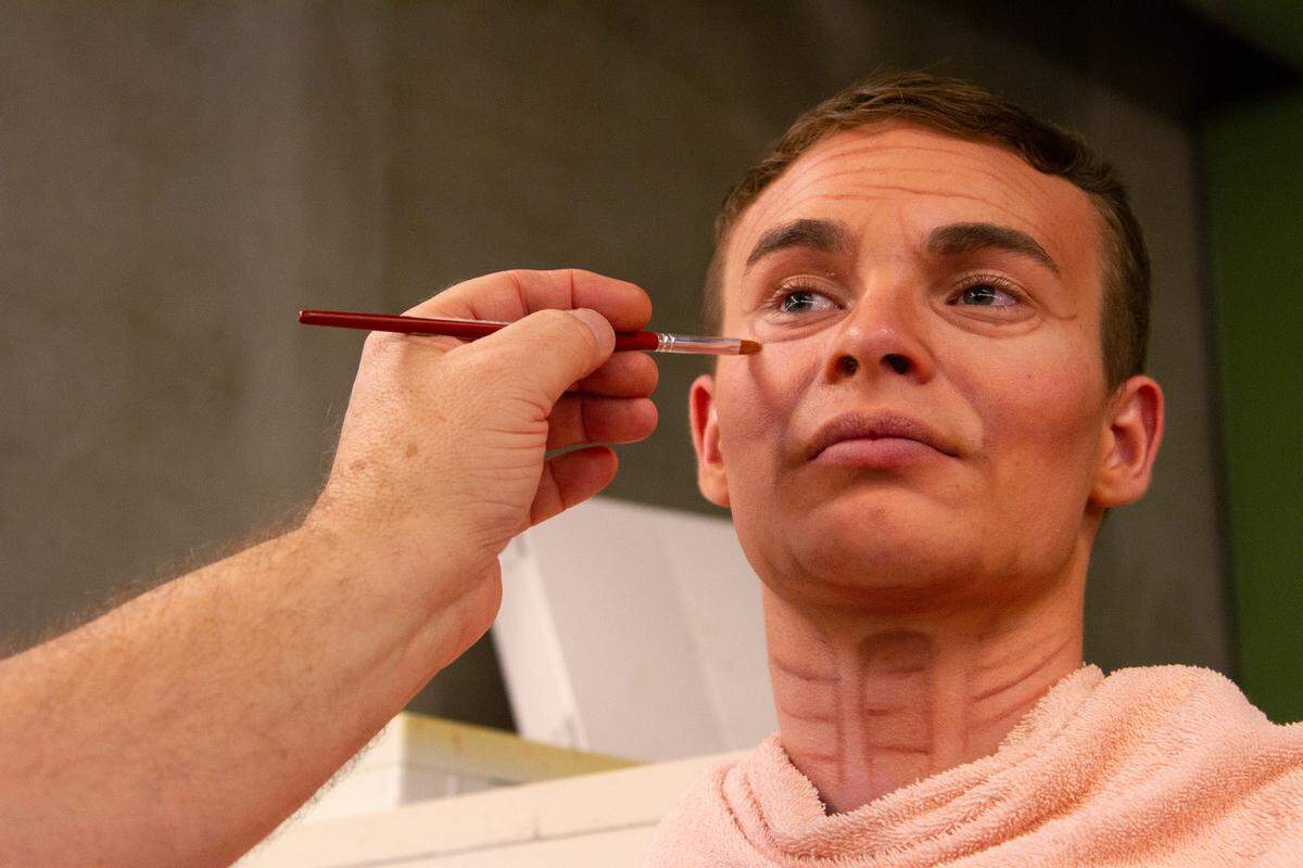 Blaze Mason, a sophomore at Madison County High School, has old age makeup applied by Columbus State University associate professor of theatre and costume design, Steven F. Graver, during a class at the 2019 Georgia Thespian Conference on Thursday, Feb. 8, 2019, at the Riverside Theatre Complex in Columbus, Ga. This is Mason’s second year attending ThesCon.