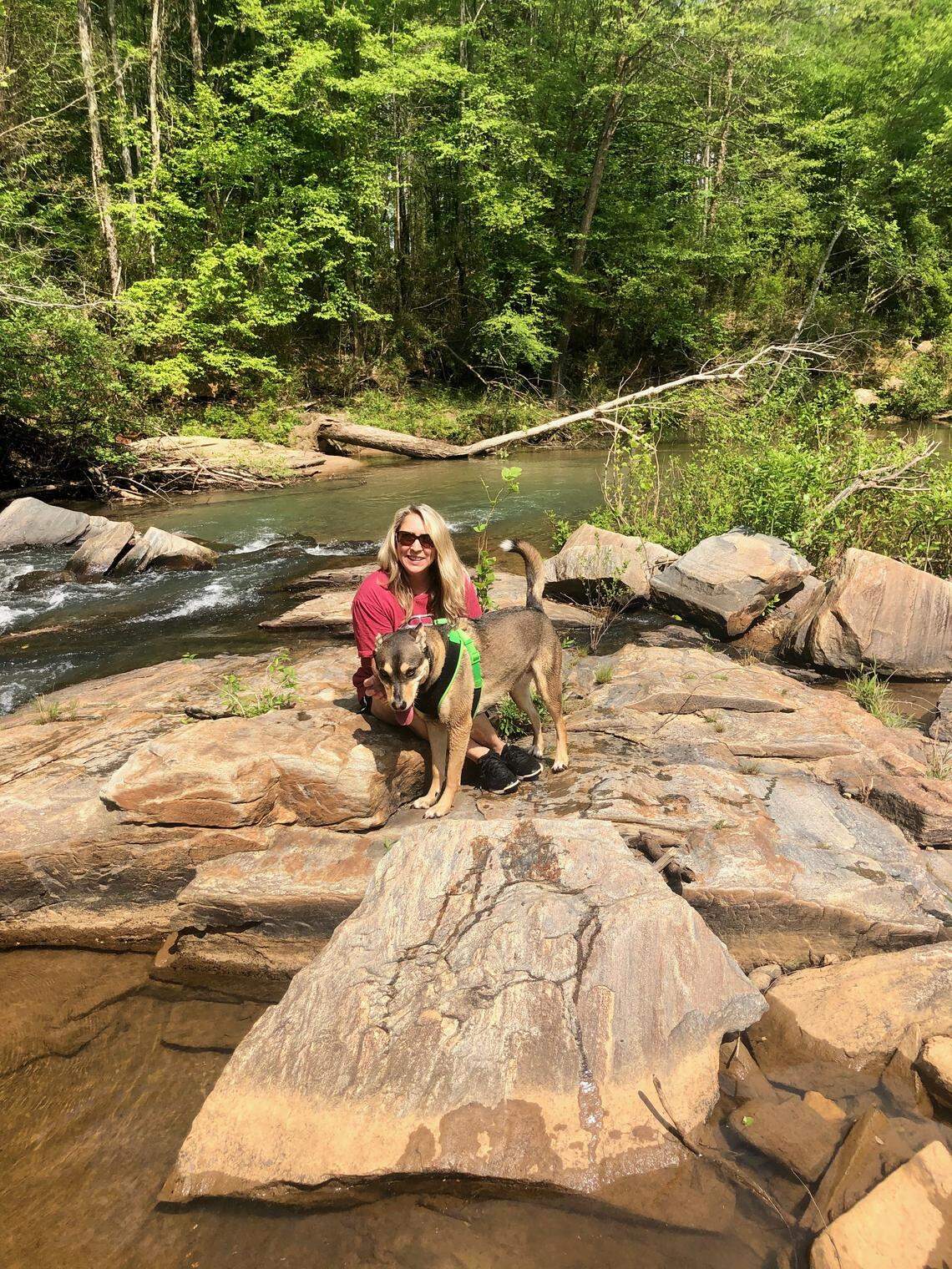 Kim Hicks, a resident of Upatoi, goes to Kendall Creek with her dog.
