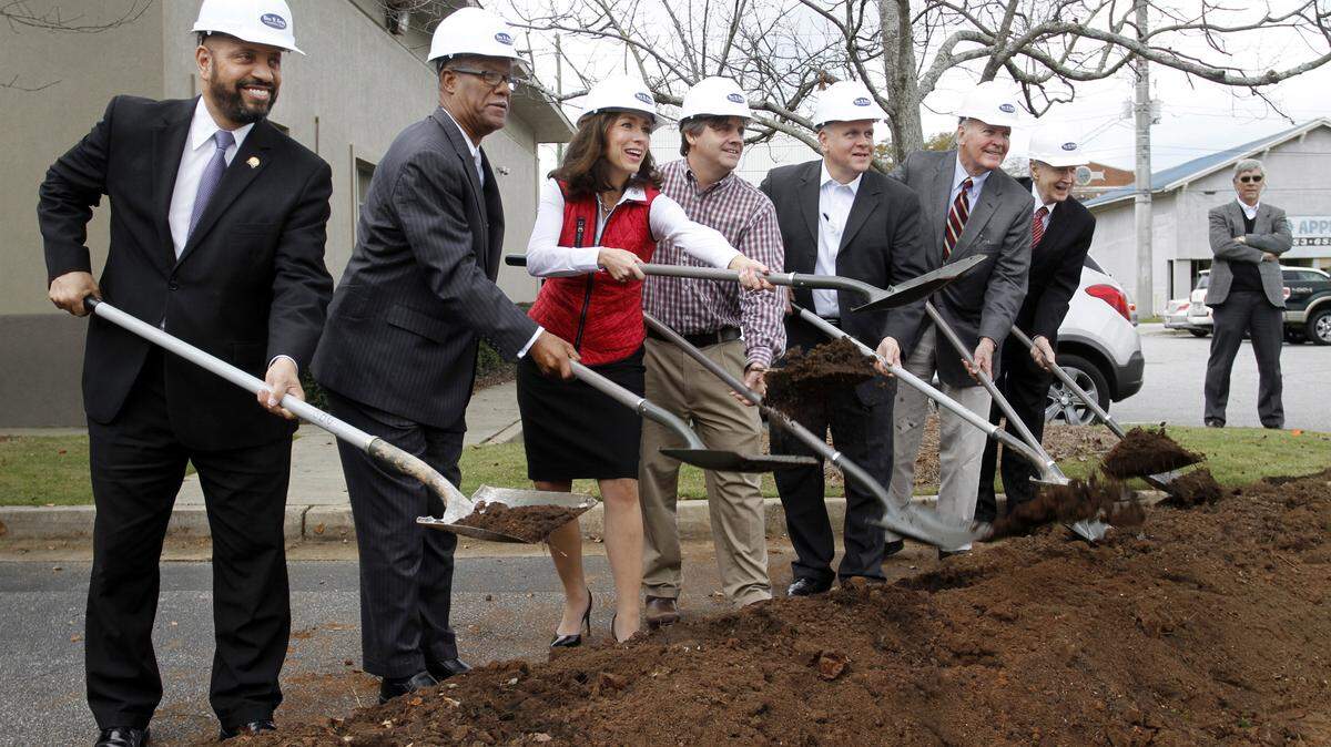 ROBIN TRIMARCHI/rtrimarchi@ledger-enquirer.comLocal public service and healthcare officials break ceremonial ground for the new MercyMed of Columbus facility to be built at its current location on Second Avenue. The clinic sees primarily uninsured, underinsured and homeless patients. From left: Councilman Bruce Huff, State Rep. Calvin Smyre, Mayor Teresa Tomlinson, Dr. Grant Scarborough of MercyMed, Columbus Regional president and CEO Scott Hill, St. Francis Hospital board chairman Richard Bradley and MercyMed board chairman Dr. Hal Brady.