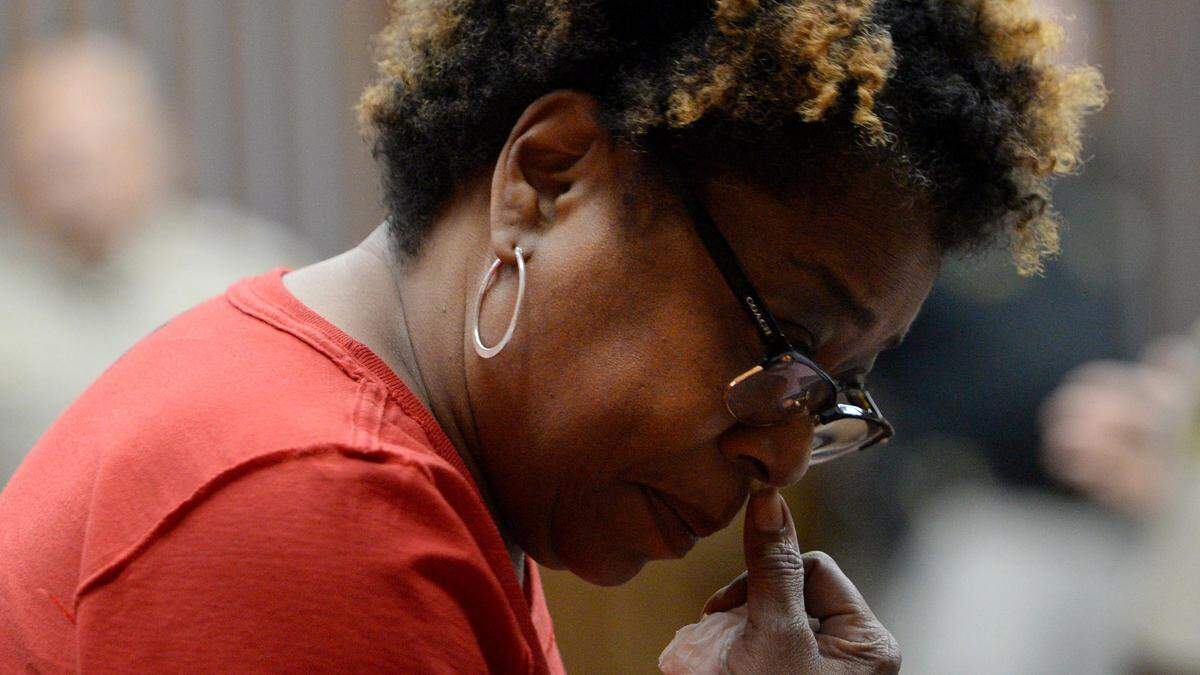 Suzette Ragland, mother of Deonn Carter, wipes a tear from her face as she goes to sit down after testifying at the sentencing hearing of Tyquez Darnell Davis who was found guilty of felony murder in the 2016 shooting of Deonn Carter.