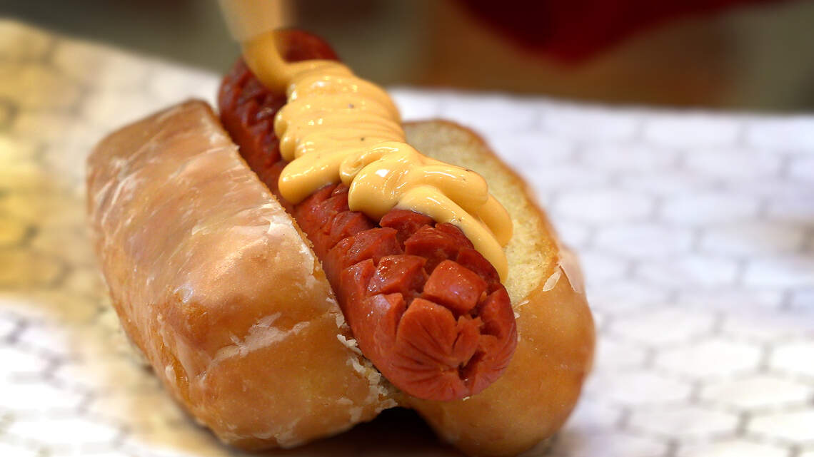 Ever had a doughnut hot dog? Downtown Columbus food spots team up for new menu item