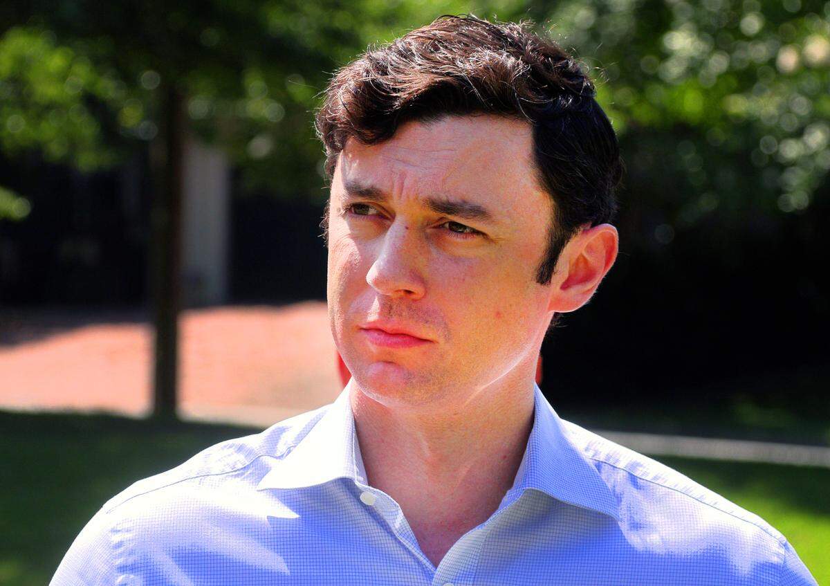 U.S. Sen. Jon Ossoff listens to a question Wednesday during a press conference at Heritage Park in Columbus, Georgia. 06/01/2022