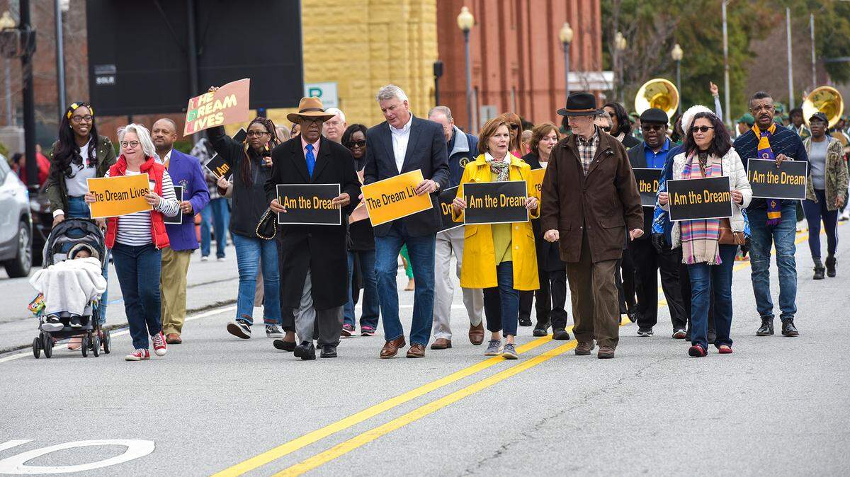 Columbus civic leaders and residents march down to the Columbus Convention and Trade Center for the MLK Dream Lives celebration, January 18, 2020.