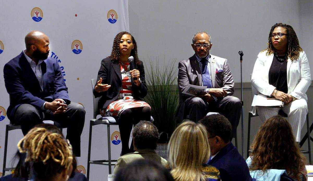 Dr. Asante Hilts, second from left, answers a question Thursday during the United Way’s 3rd Annual Black History Panel in honor of Black History Month at the Columbus Civic Center in Columbus, Georgia. The other panelists were Norman Hardman, Oz Roberts, and Toyia Tucker. 02/10/2023