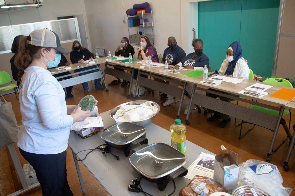 Course instructor and dietician Jamie Benefield, RD, leads the “Cooking Matters” class at The Food Mill in Columbus, Ga. on March 14, 2022.