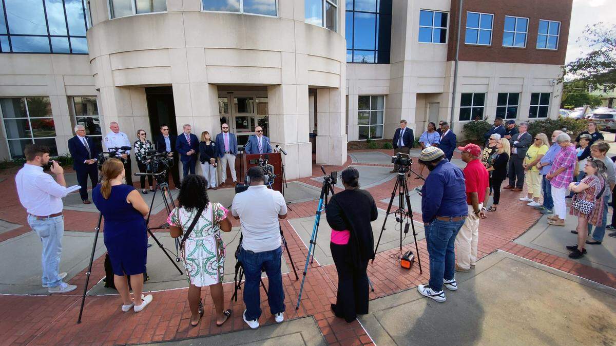 Deputy Chief Lance Deaton of the Columbus Police Department, at podium, speaks during a Tuesday afternoon press conference about Columbus Animal Care & Control.