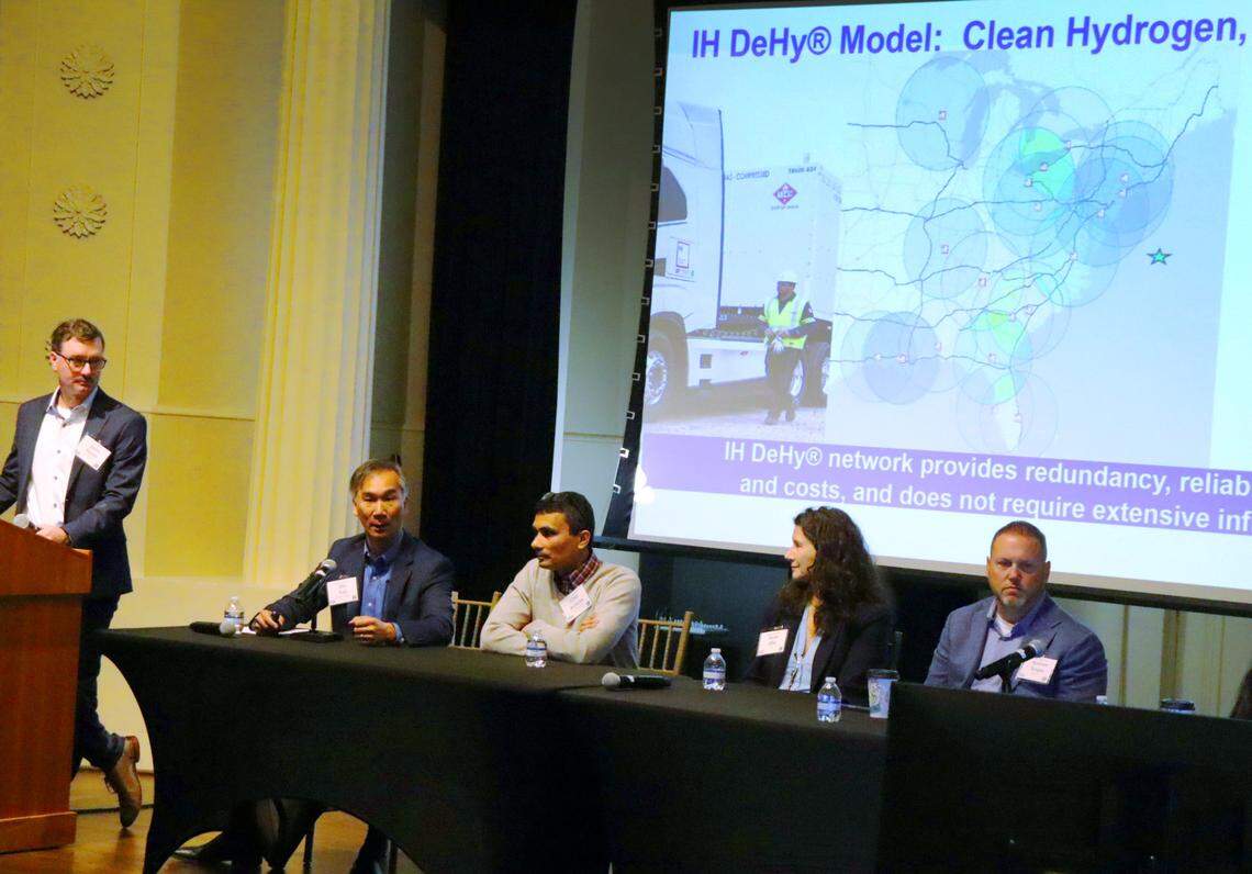 Panelists at the Clean Cities Georgia Hydrogen Summit at Georgia Institute of Technology on Dec. 4 present opportunities and overcoming challenges. Dat Tram, CEO of Independence Hydrogen, left, explains the company’s business model.
