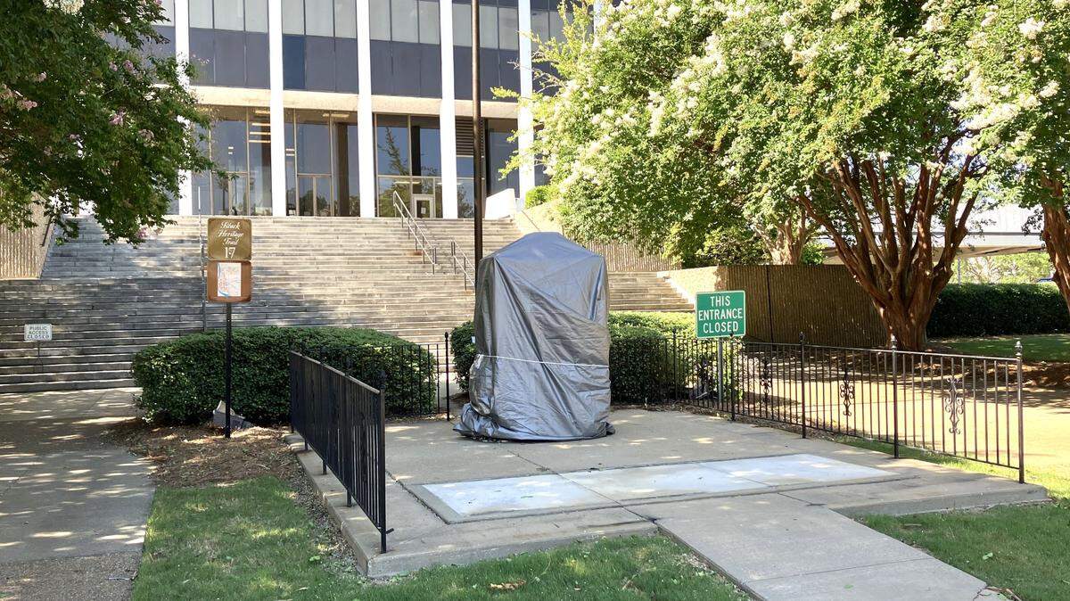 The eternal flame that was dedicated in 1991 dedicated at the south side of the Columbus Government Center on May 23, 1991, has been covered by a tarp while construction of the Judicial Center is conducted on the north side of the Government Center.