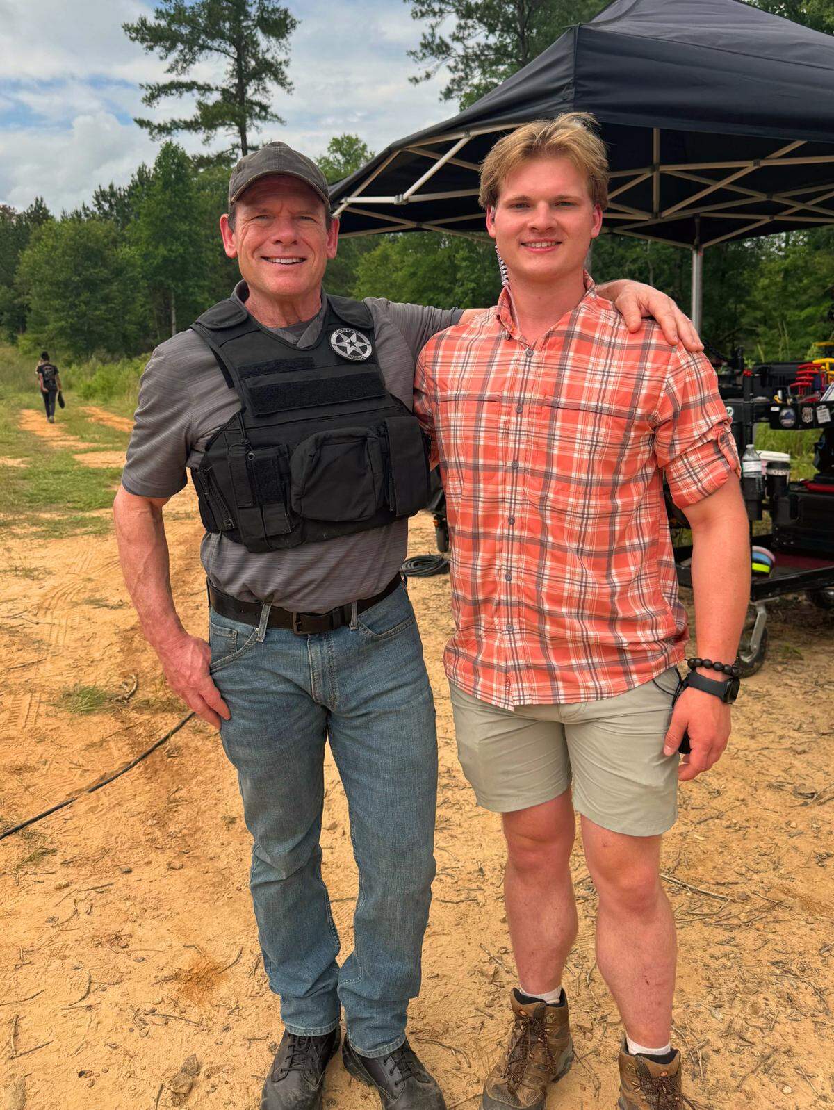 Columbus State University student Dawson Shand poses with his father, David Shand, on “The Life and Deaths of Wilson Shedd” set in Hamilton, Georgia. Dawson worked as a set intern for the production and David had a role as an extra in the movie being filmed in Columbus and the surrounding area.
