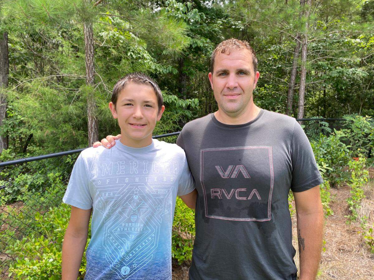 U.S. Army Sgt. 1st Class Joe Musolino, stationed at Fort Benning, and his 13-year-old son, Lorenzo, are the heroes who found Eric Tindall 19 hours after the June 24, 2020, wreck that left Tindall alone and trapped upside down in his flipped car that crashed into woods off a rural Harris County road.