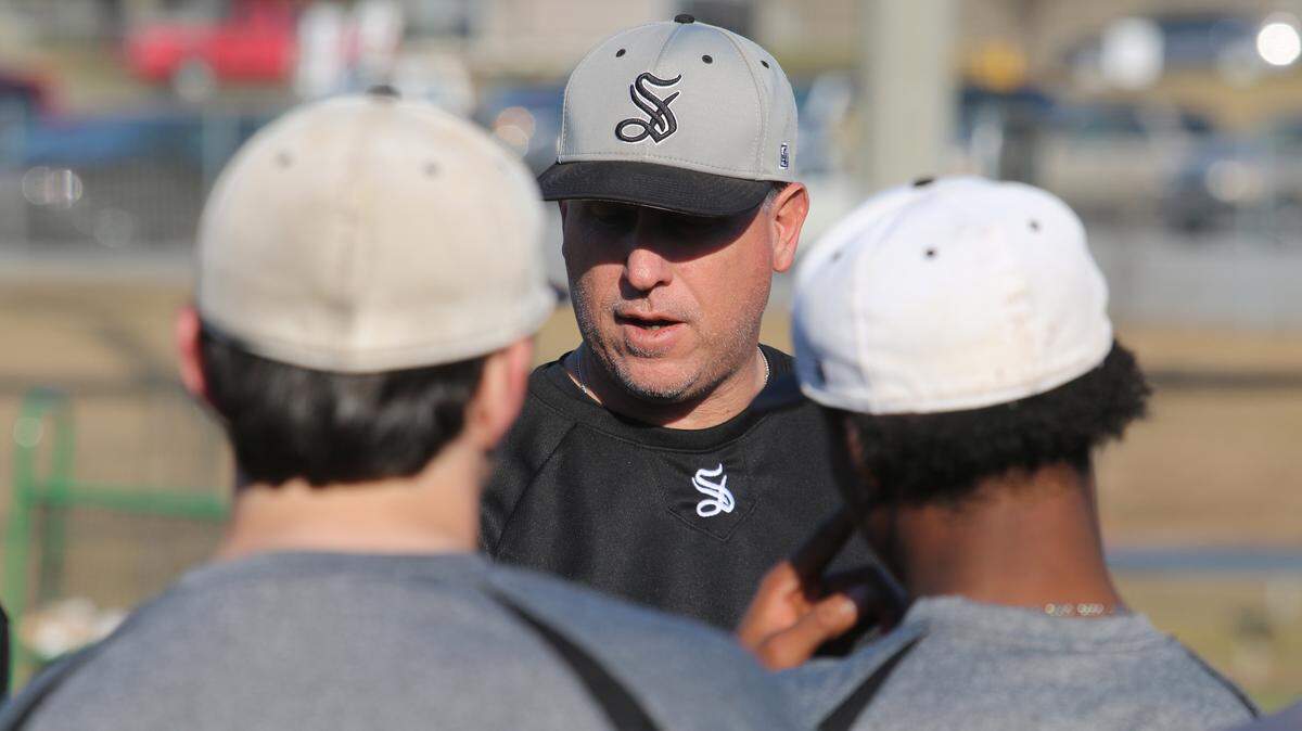 David Mitchell/dmitchell@ledger-enquirer.com 
 Smiths Station coach Mike Ferry talks to his team before practice on Thursday.