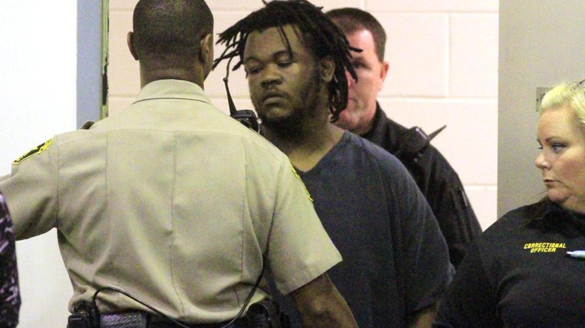 Akeveius Powell enters the courtroom Tuesday morning for a preliminary hearing in Columbus Recorder's Court.