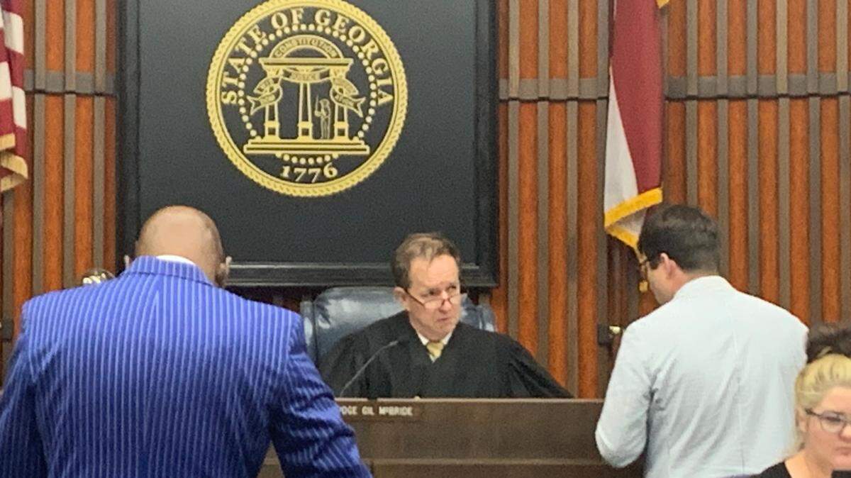 Judge Gil McBride talks to the counselor for defendant Justin Roberts in a hearing Thursday in Columbus. 7/13/2023