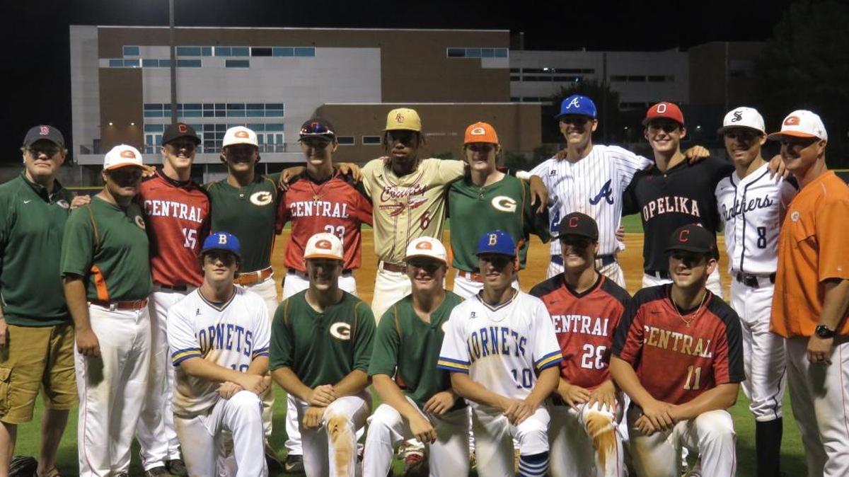 Team Alabama poses after pulling off an 8-4 victory over Team Georgia at Columbus State’s Burger King Stadium on Wednesday, June 7, 2017.