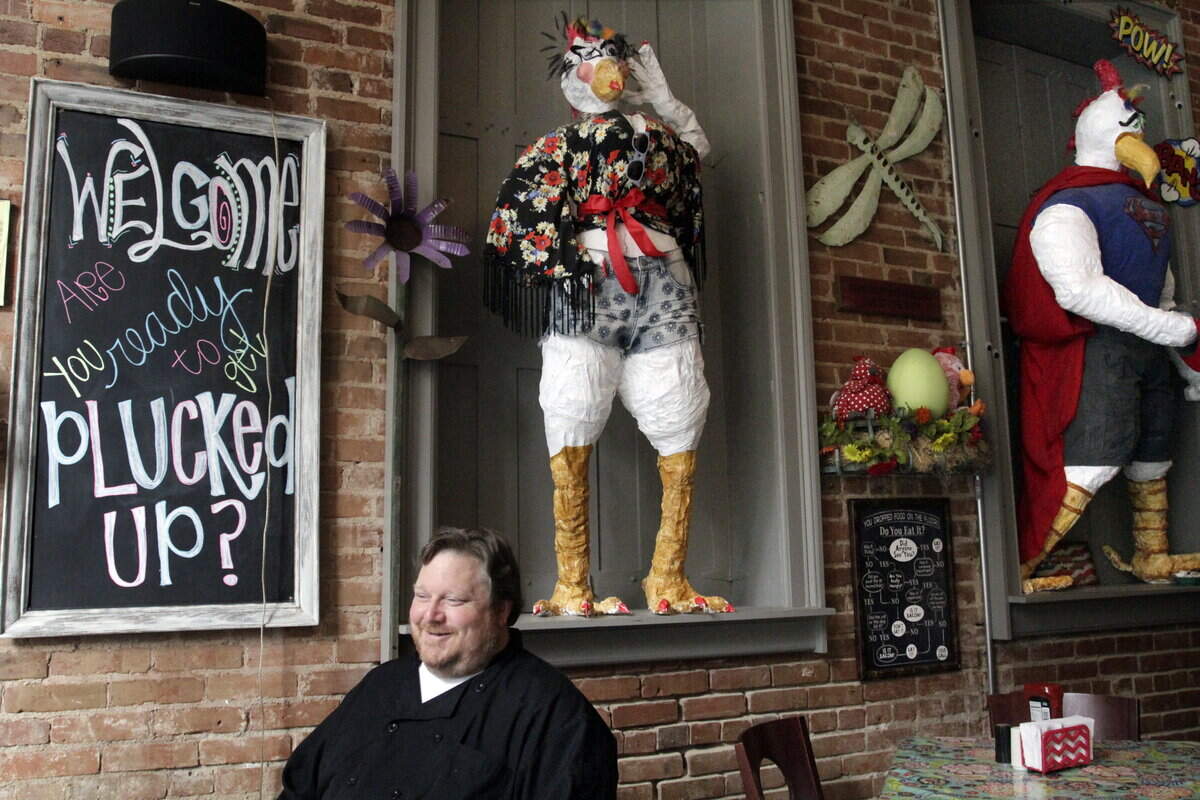 ROBIN TRIMARCHI/rtrimarchi@ledger-enquirer.comMark Jones talks with Ledger-Enquirer senior reporter Chuck Williams at his downtown restaurant Plucked Up for the Sunday Interview.