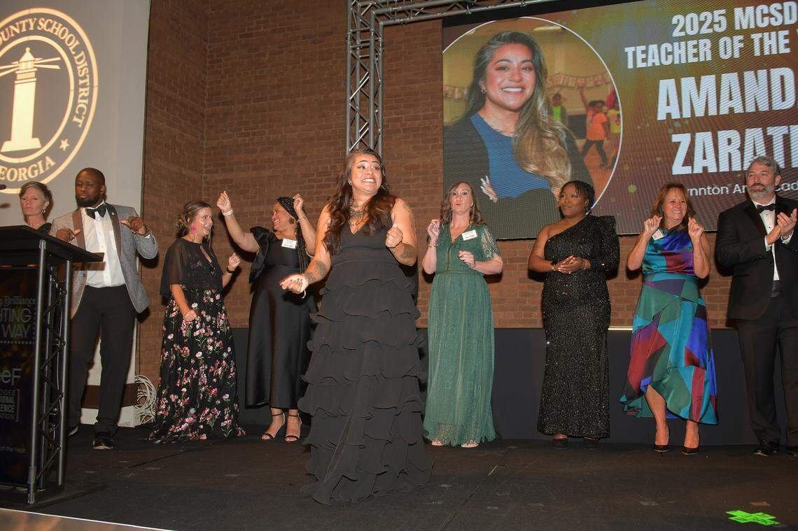 Amanda Zarate, a theater teacher at Wynnton Arts Academy, asked the crowd to dance with her following her acceptance speech after she was announced as the Muscogee County School District 2025 Teacher of the Year during the Muscogee Educational Excellence Foundation gala May 1 in the Columbus Convention & Trade Center.