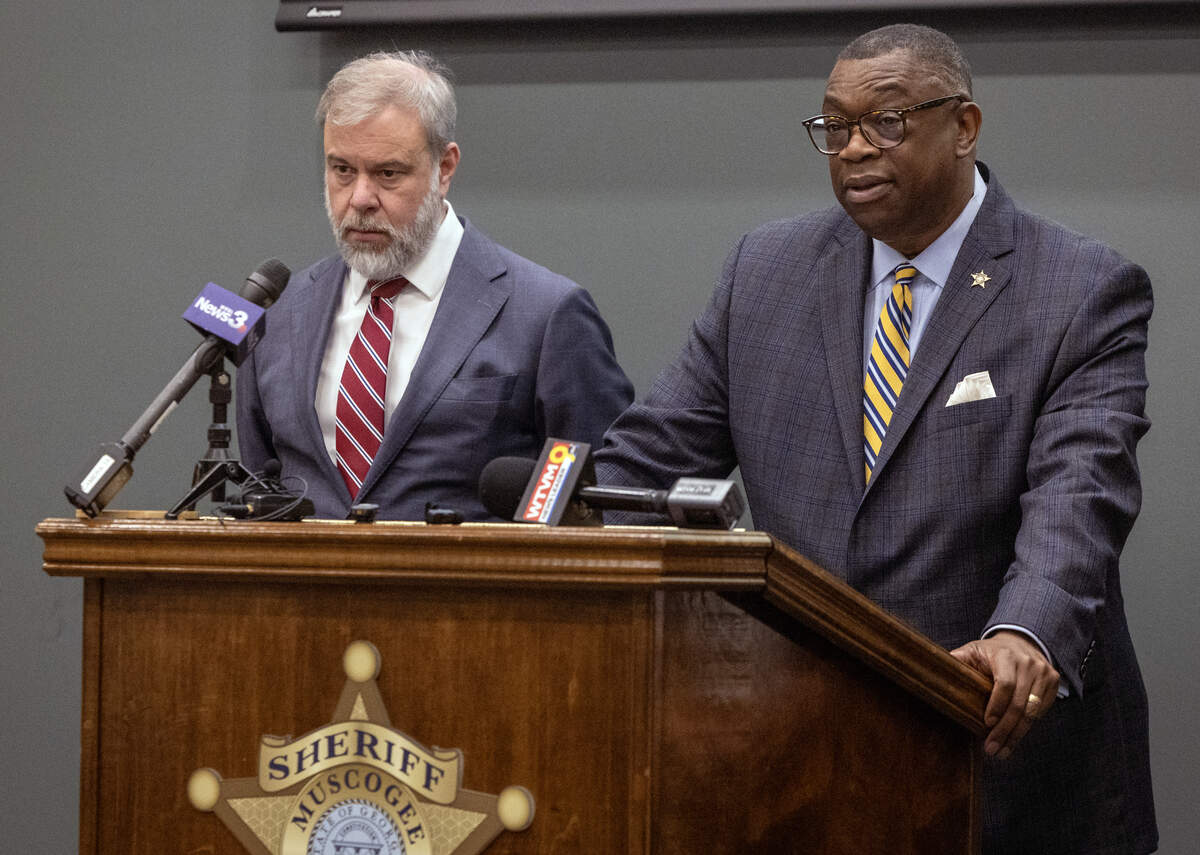 Muscogee County Sheriff Greg Countryman, right, and Chattahoochee Judicial Circuit District Attorney Don Kelly conduct a news conference June 18, 2026, to announce the arrest of two men, now charged with trafficking cocaine, and the seizure of 42 pounds of cocaine worth an estimated $2.3 million.