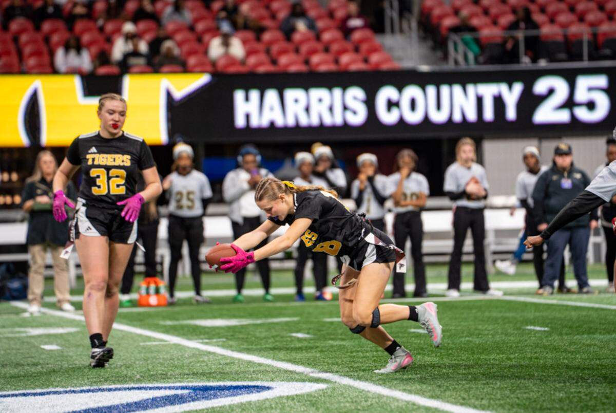 Harris County junior center Aubry Mertz runs after a reception during the Georgia High School Association Division 1 flag football state championship game Dec. 15, 2015, at Mercedes-Benz Stadium in Atlanta. The Tigers beat Washington County 32-0 to win the title.