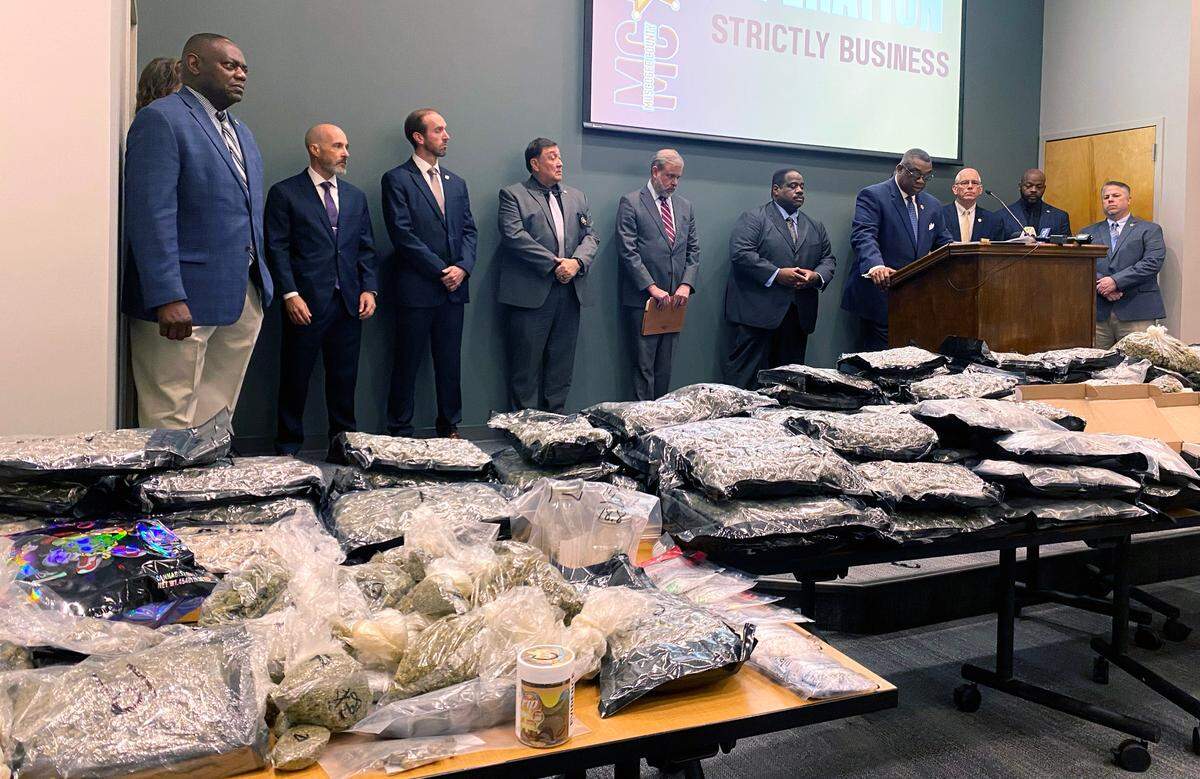 Muscogee County Sheriff Greg Countryman, at podium, gives the details of Operation Strictly Business during a November 25, 2024 press conference at the Muscogee County Sheriff’s Office in Columbus, Georgia.