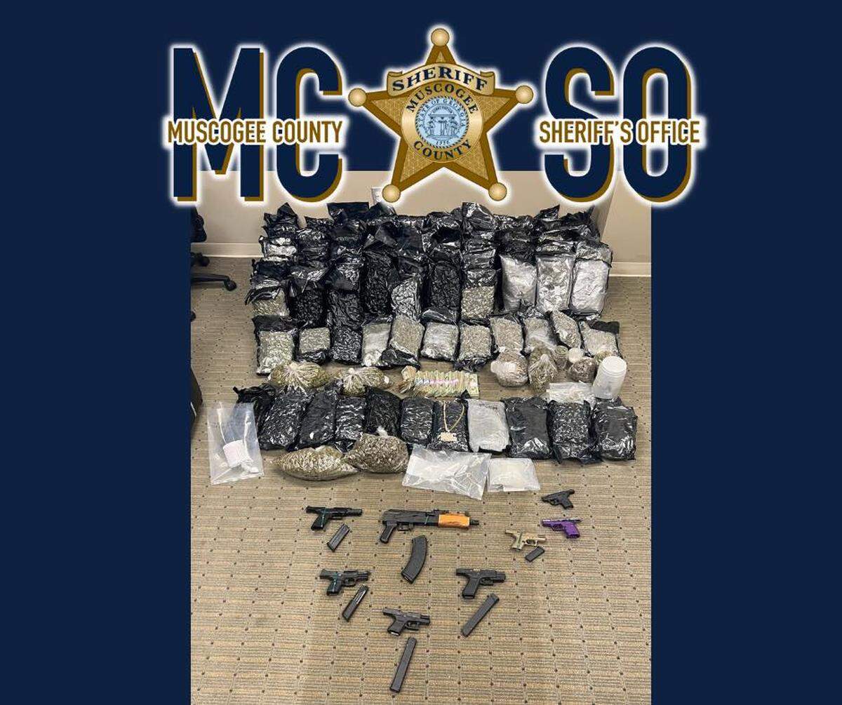A picture of drugs, guns and cash seized by the Muscogee County Sheriff’s Office through multiple search warrants in Muscogee County.