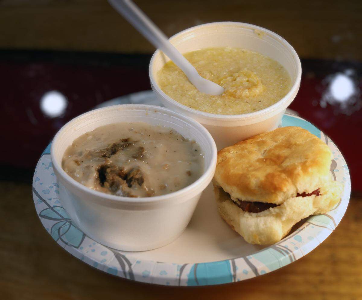 Ledger-Enquirer reporter Kelby Hutchison ordered a biscuit with link sausage, cheese grits and the biscuit and gravy from Express Market, 1465 54th St. in Columbus, on Sept 19, 2025.
