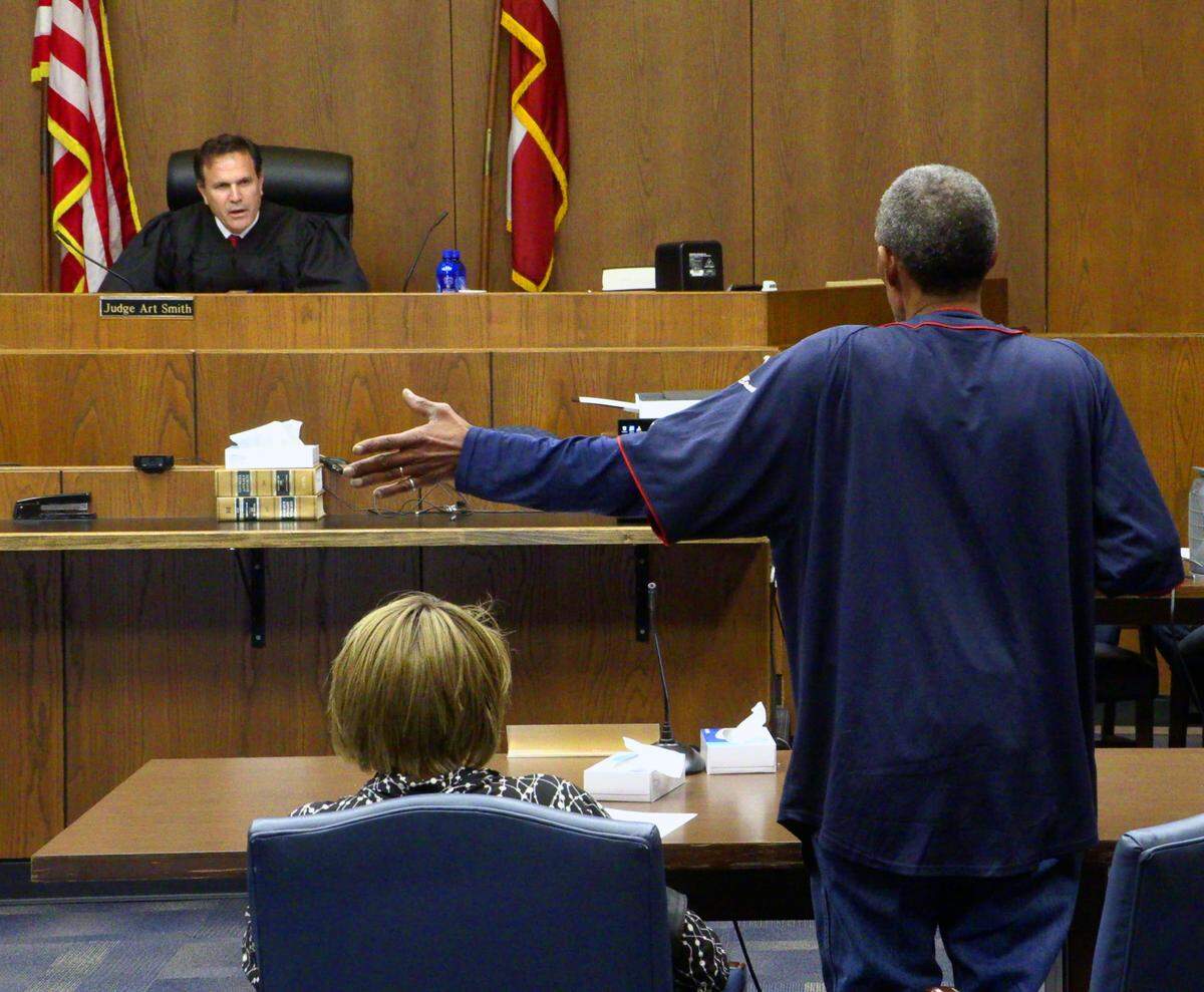 Edward Murray, right, asks Judge John Martin a question during the hearing Friday afternoon. 03/31/2023