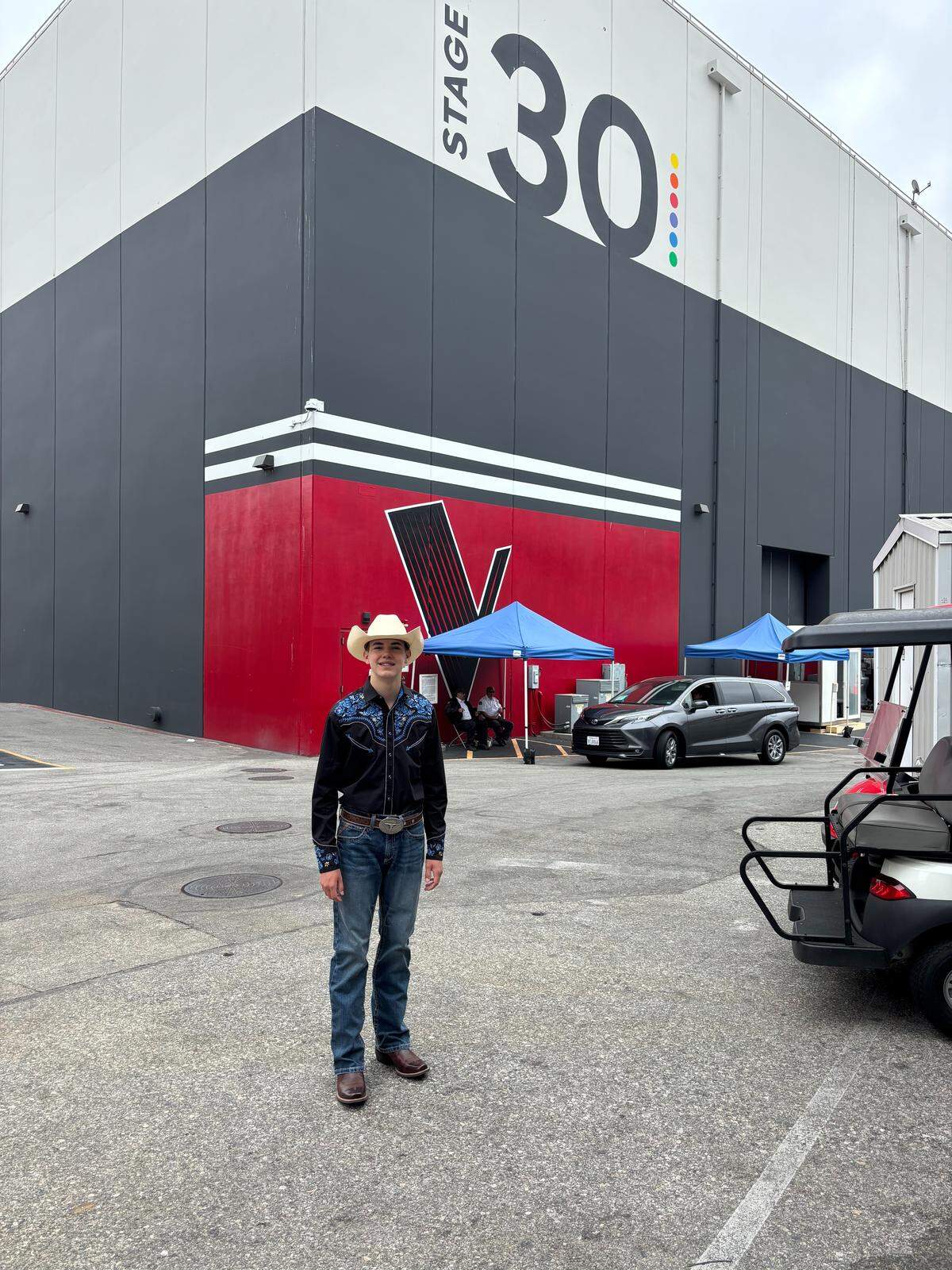 AJ Robinson of Cataula in Harris County, a ninth-grader at Calvary Christian School in Columbus, poses for a photo at Universal Studios in Hollywood, California, where he performed during the Feb. 23, 2026, episode of the singing competition TV show “The Voice” on NBC.