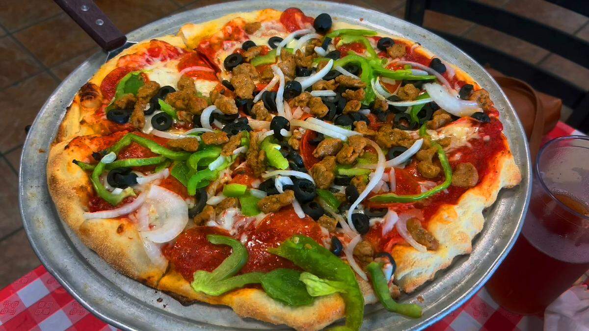 This is the Deorio’s Deluxe pizza that Ledger-Enquirer reporter Kelby Hutchison ordered Friday at Deorio’s Pizza in Columbus, Georgia. 08/09/2024