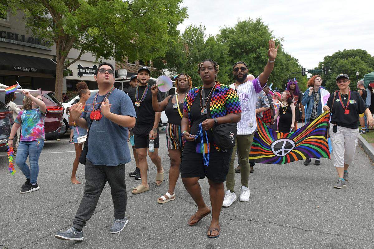Parade participants march along the parade route at the 2024 Columbus Georgia LGBTQIA+ Pride Festival on Saturday. 06/01/2024