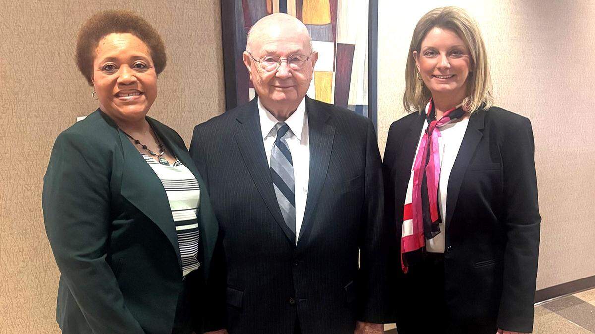 Alabama Community College System chancellor Jimmy Baker, center, visited the campus Monday in Phenix City and announced the appointment of Annette Funderburk, right, as CVCC’s interim president. Funderburk, who has been president of J.F. Ingram State Technical College in Deatsville, Alabama, for the past seven years, temporarily replaces the reitred Jackie Screws, left, as CVCC’s leader until a permanent successor is hired.