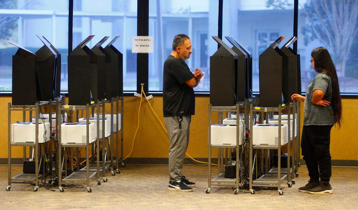 Voters cast their ballots Tuesday morning at a voting precinct inside Columbus Technical College in Columbus, Georgia. 11/05/2024