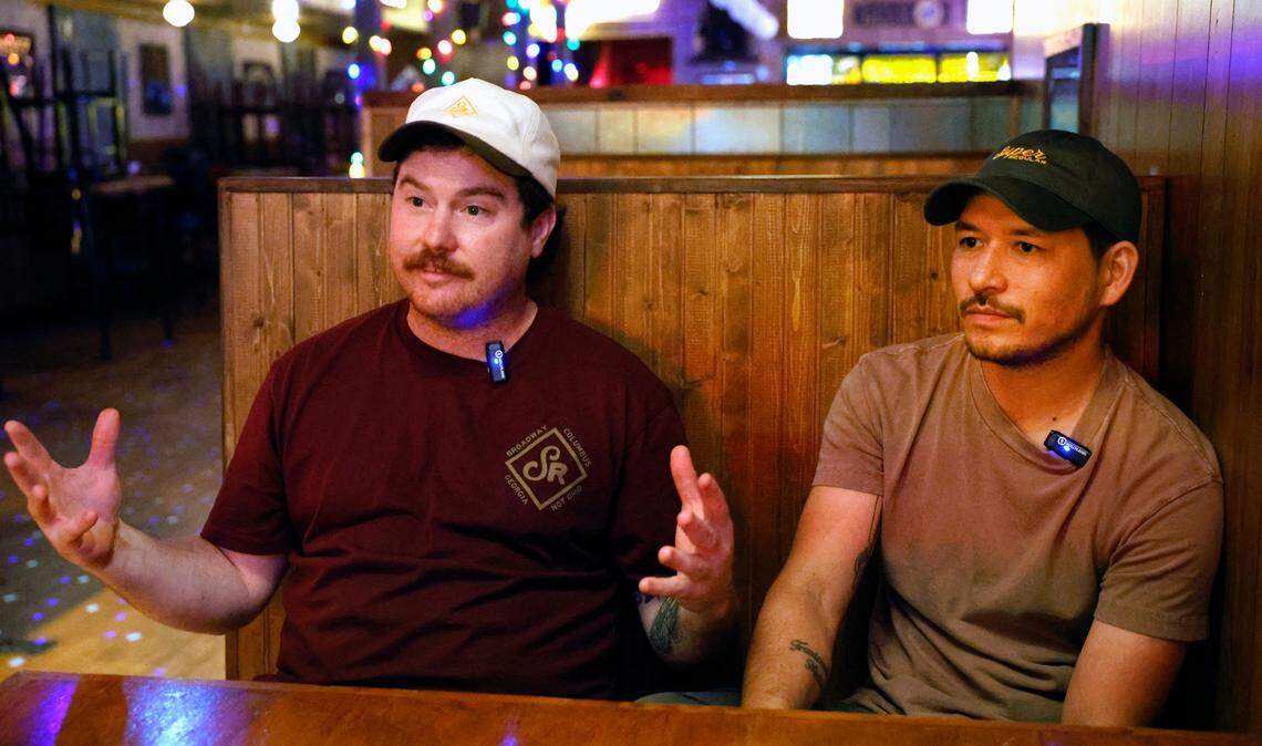 Chad Scrimpshire, left, and Miles Greathouse, two of the co-owners of Super Regular in Columbus, talk with the Ledger-Enquirer about the process of opening the new bar. 