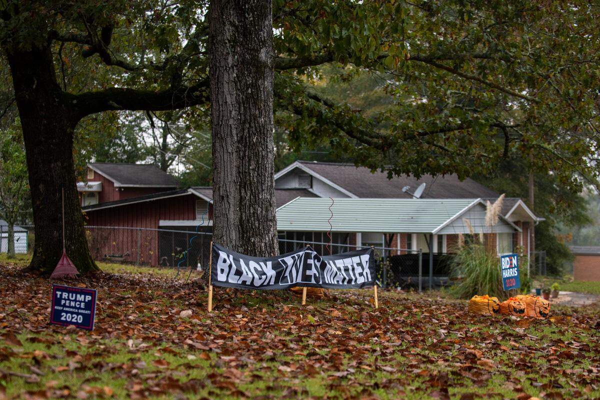 Julia Whitmore’s yard represents a family with varying political opinions but acceptance for one another, on Oct. 27, 2020 in Warm Springs, Georgia.