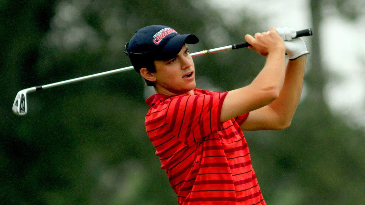 JOE PAULL/Ledger-Enquirer 
Columbus State University golfer Robert Mize tees off during the opening round of the 2014 Alfac/Cougar Invitational at the Country Club of Columbus.