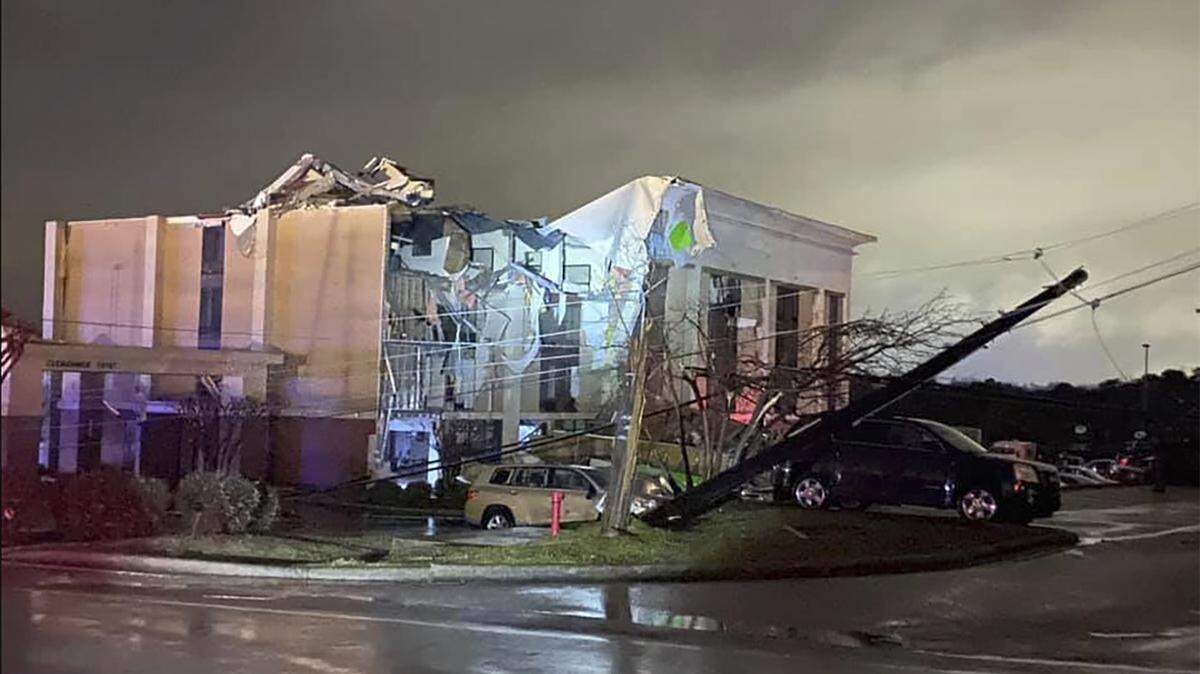 A Hampton Inn hotel is severely damaged after a tornado tore through Fultondale, Ala., on Monday, Jan. 25, 2021. (Alicia Elliott via AP)