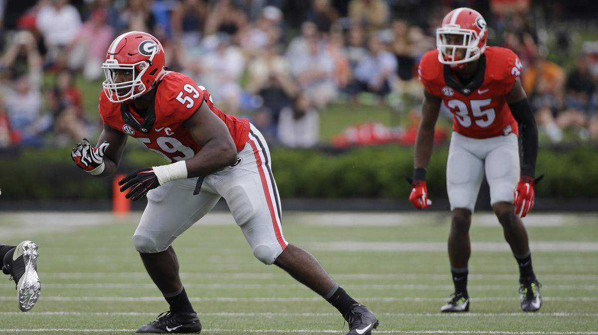 MARK HUMPHREY/Associated PressGeorgia linebacker Jordan Jenkins (59) and cornerback Aaron Davis (35) line up against Vanderbilt Sept. 12 in Nashville, Tenn.