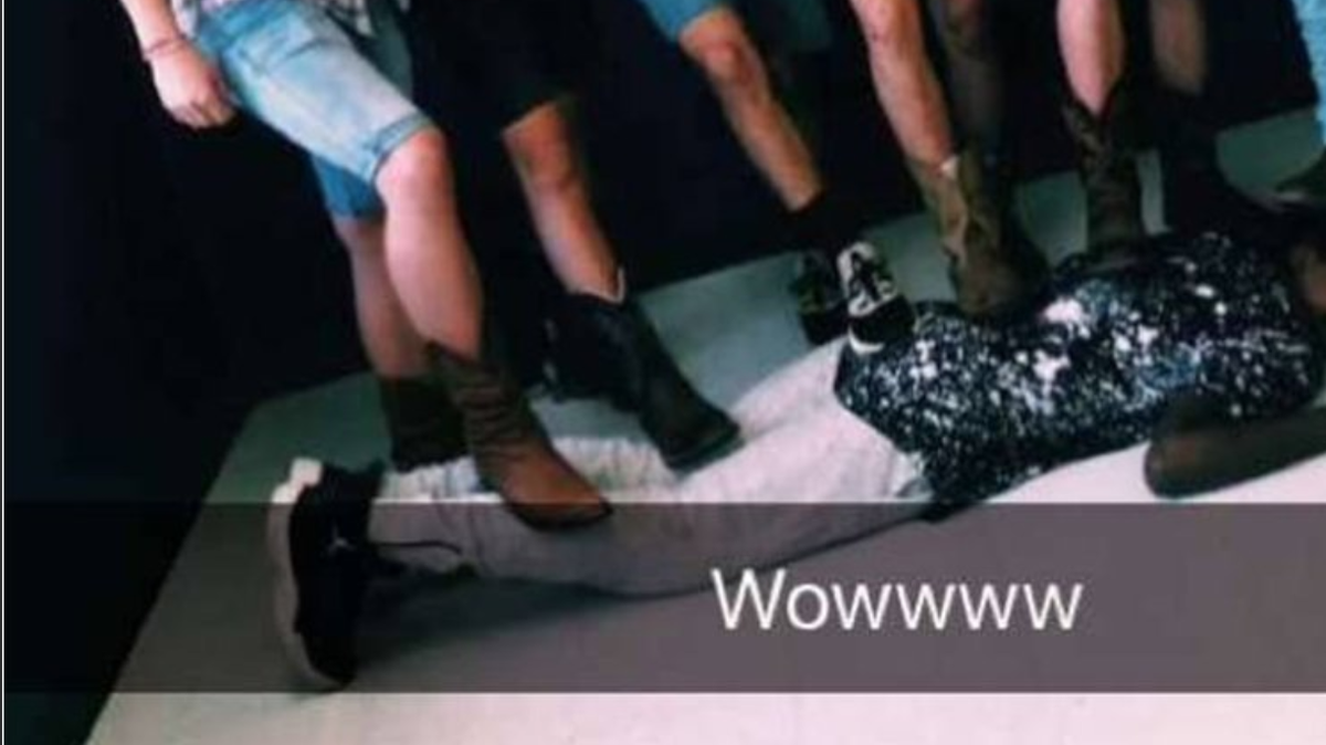 White students were pictured standing on a black student at Moody High School in St. Clair County, Alabama, with the caption “we got us one.” The students, who are all friends, said it was meant to be a joke.