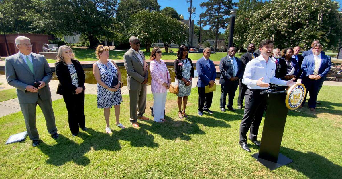 U.S. Sen. Jon Ossoff answers questions Wednesday during a press conference at Heritage Park in Columbus.
