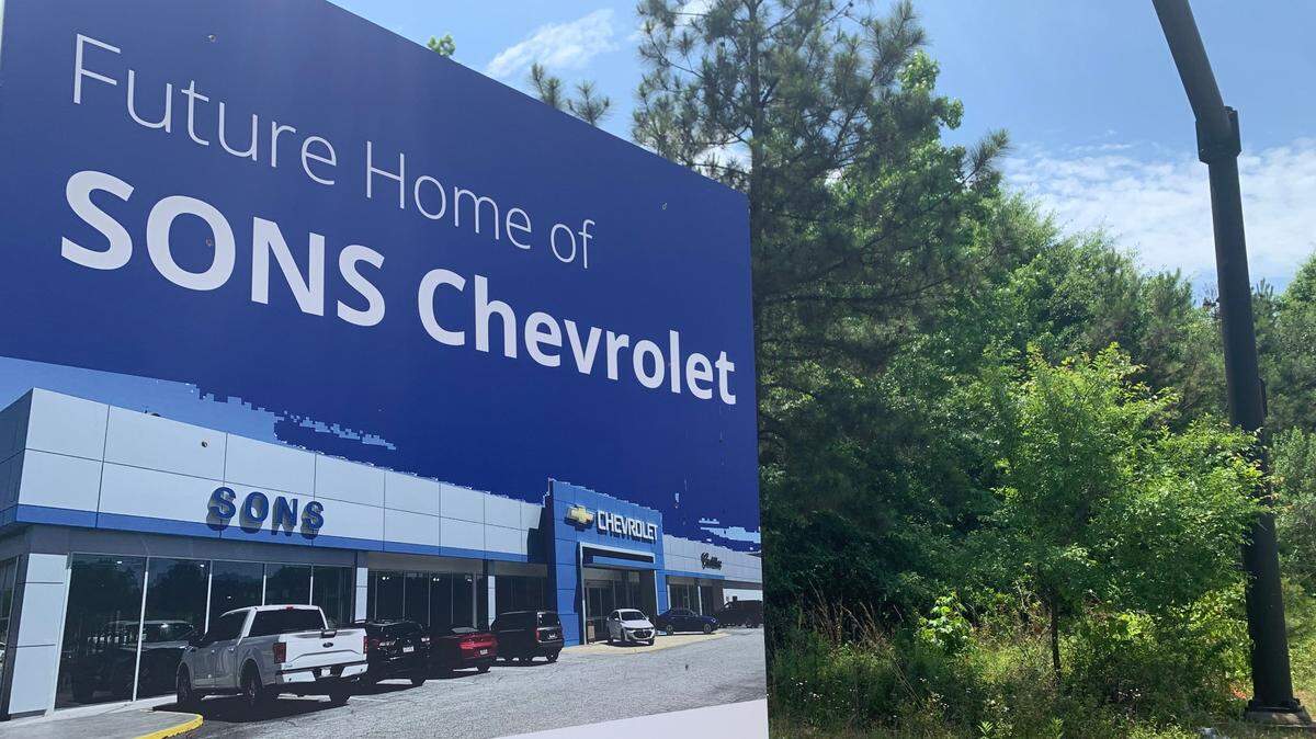 A sign located on Whittlesey Boulevard in Columbus across from Sonic Drive-in stating the future home of SONS Chevrolet.