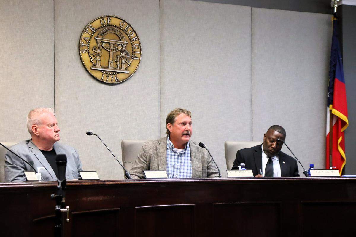 Councilmember Mark Mitchell, Mayor Jim Arrington and Councilmember Leon Childs discuss passing a moratorium on data center development in LaGrange.