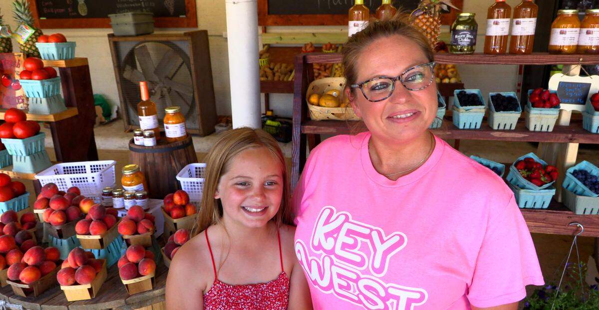 Amber Napier and her daughter Zoie answer questions about the family’s newly opened Napier’s Midtown Market, located at 2213 Wynnton Rd. in Columbus, Georgia. 05/29/2024
