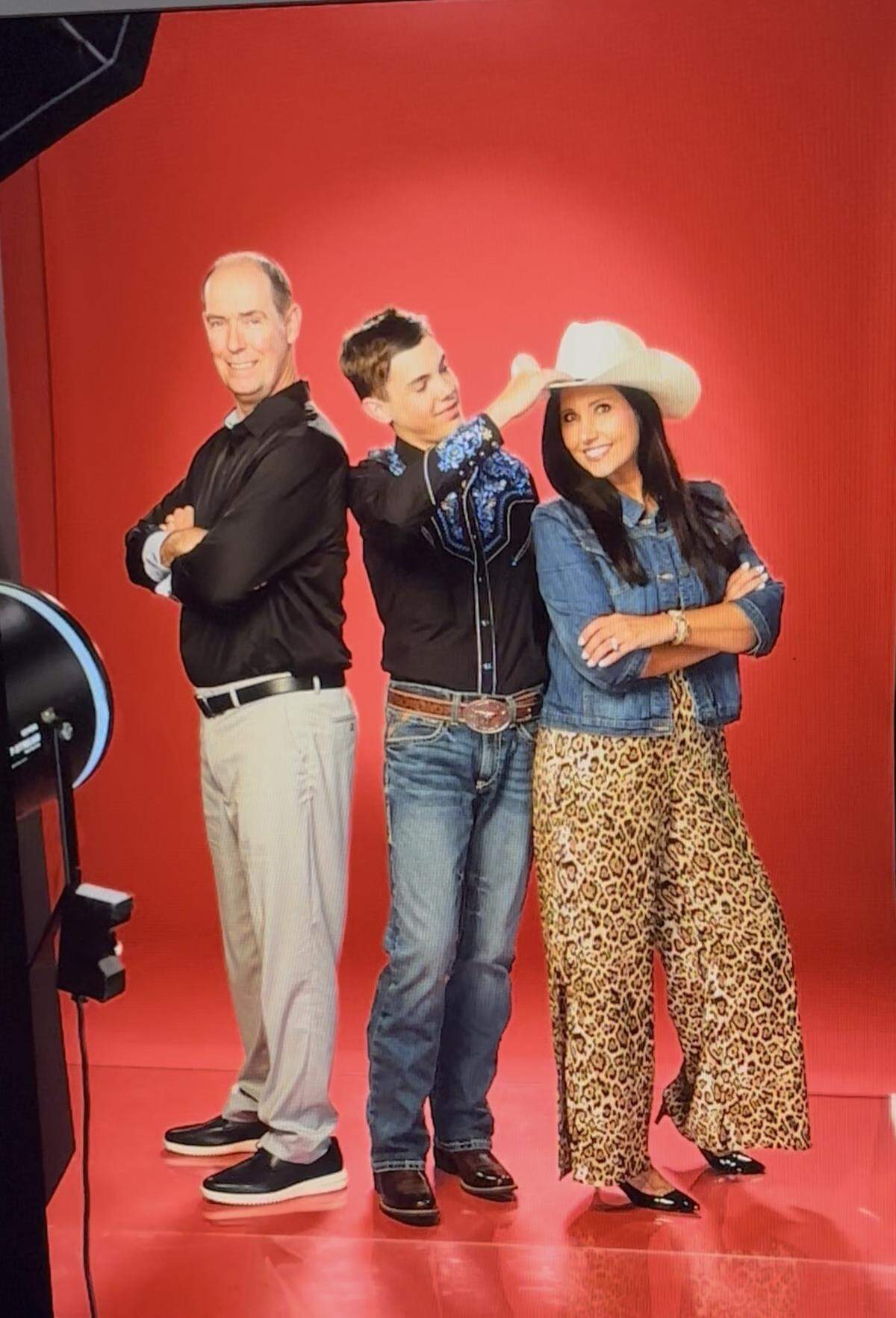 AJ Robinson of Cataula in Harris County, a ninth-grader at Calvary Christian School in Columbus, poses with his father, Stephen, and his mother, Shannon, for a promotional photo at Universal Studios in Hollywood, California, where AJ performed during the Feb. 23, 2026, episode of the singing competition TV show “The Voice” on NBC.