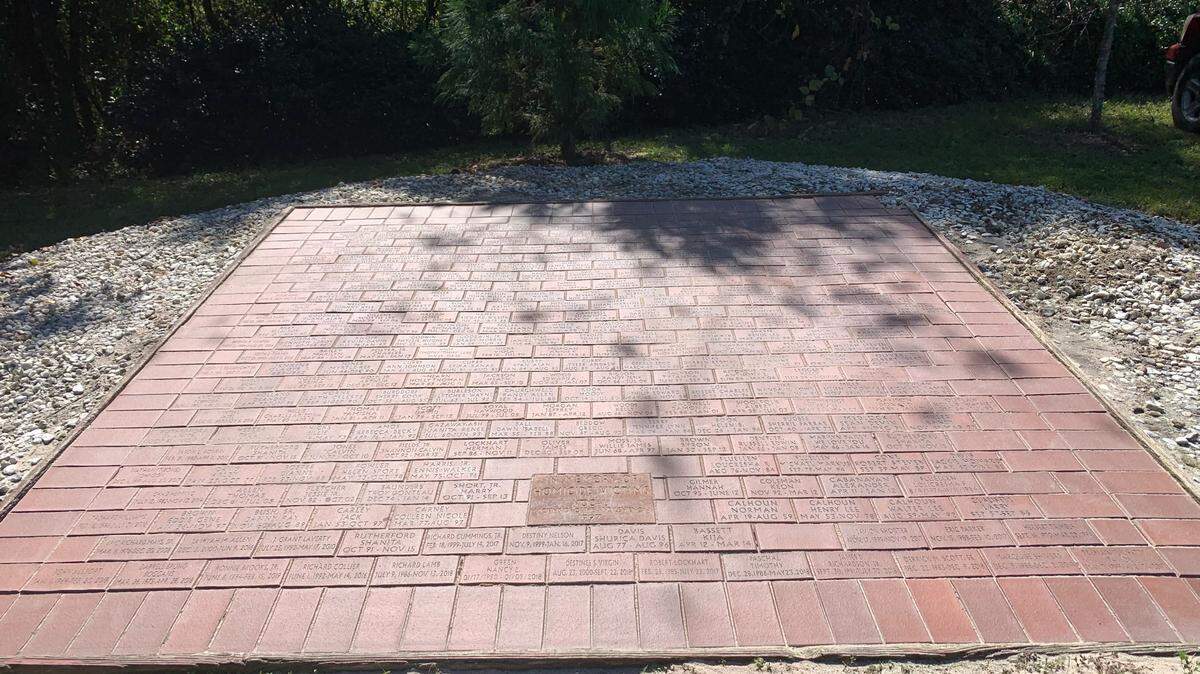 Family members of homicide victims came together Friday, Oct. 14 to help restore the Homicide Victims Memorial.