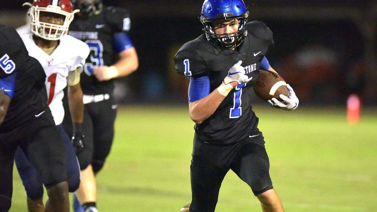 Brookstone’s Rylan Cowart turns the corner and heads up field for an 11-yard carry and a first down in the second quarter of the game against Pacelli Friday night, September 28, 2018