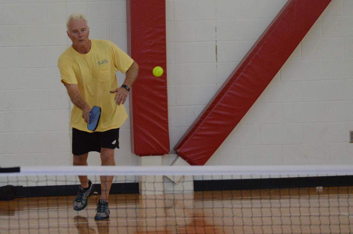 A player prepares to return a shot.