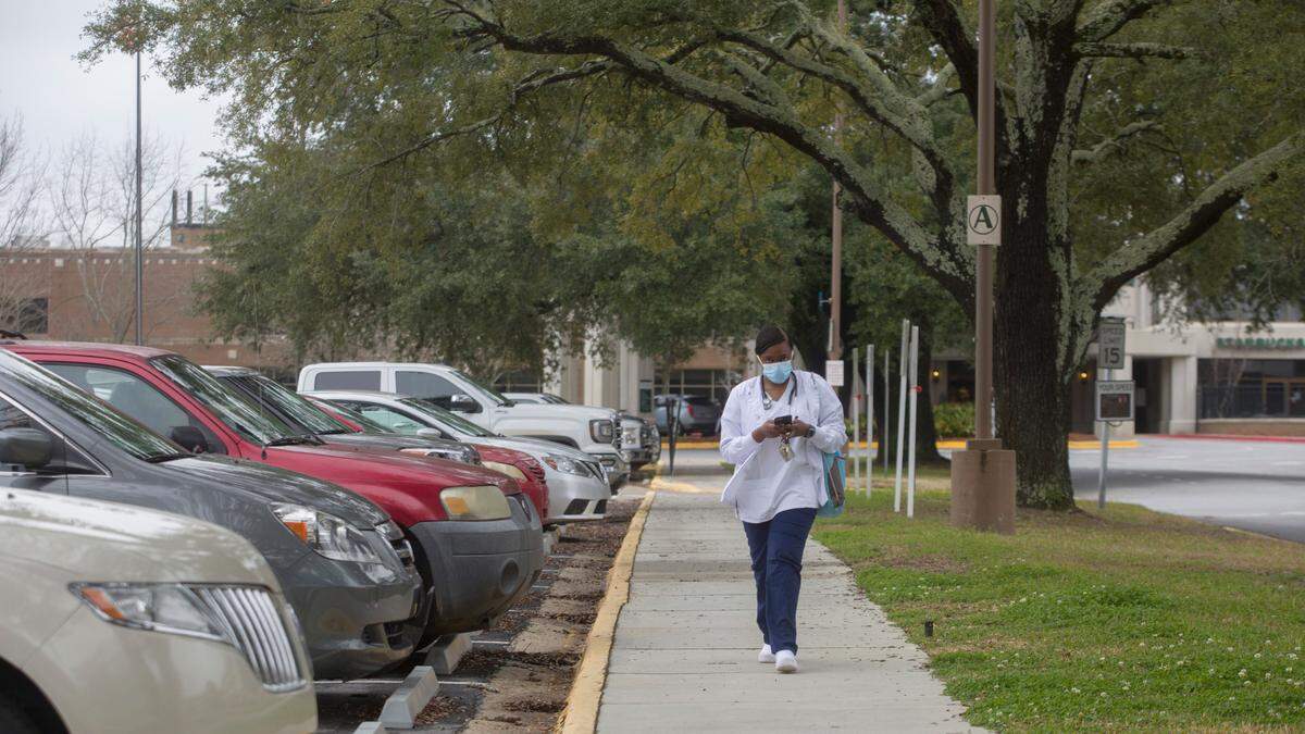 A healthcare worker leaves the Phoebe Putney Memorial Hospital in Albany, Georgia,on Feb. 19, 2021. The hospital is currently vaccinating Georgia residents eligible in Phase 1A+ of the state’s rollout plan.