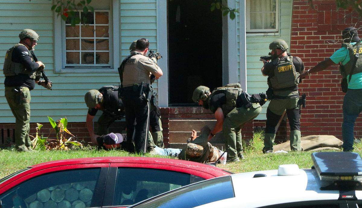 Deputies with the Muscogee County Sheriff’s Office made multiple arrests from a house 3706 14th Avenue in Columbus, Georgia on Friday afternoon. 